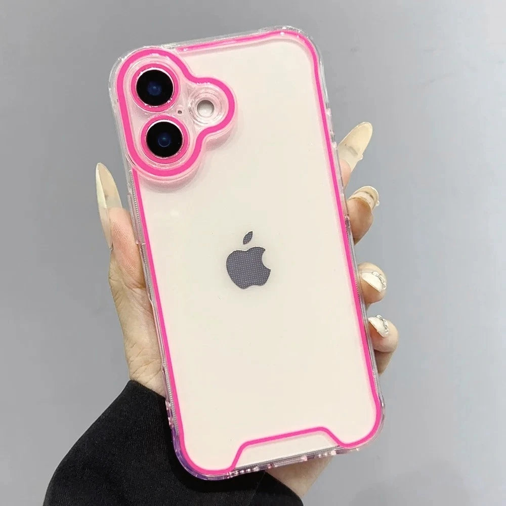A hand holds a clear phone case with neon pink trim and glow-in-the-dark features for an iPhone.