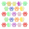 A collection of colorful squishy cat paw fidget toys in various shades including green, yellow, purple, and pink.