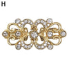 Gold vintage swirl clip featuring clear rhinestones used to fasten cardigans and shawls