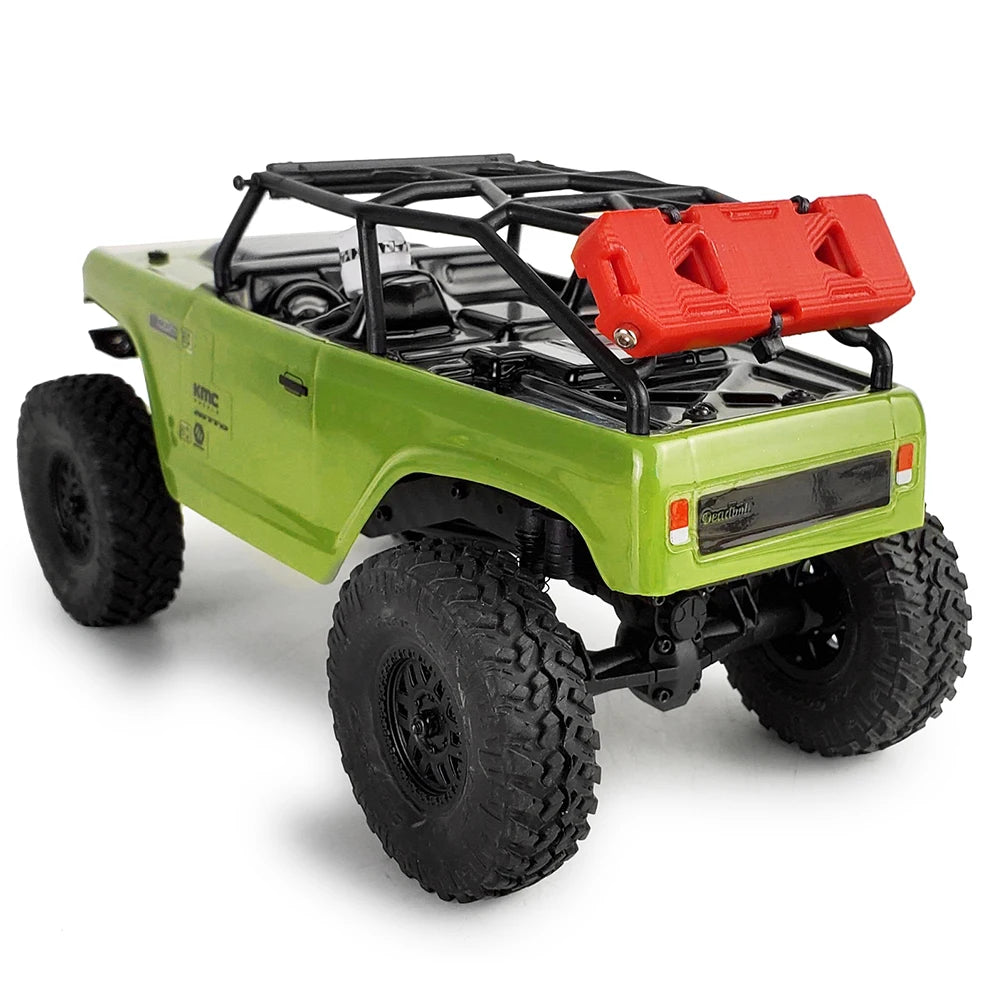 Lime green RC crawler vehicle with a black roll cage and red tool box.