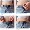 Demonstration of installing metal buttons to expand the waist of denim jeans.