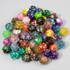 A pile of ten polyhedral dice in various colors and shapes for tabletop role-playing games