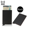 A black slim metal RFID blocking card holder with a pop-up design and a stack of cards.