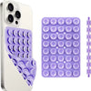 A white smartphone case and a purple suction cup phone mount with multiple silicone domes for hands-free use.