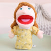 A soft plush hand puppet with brown hair and red lips wearing a yellow floral shirt.
