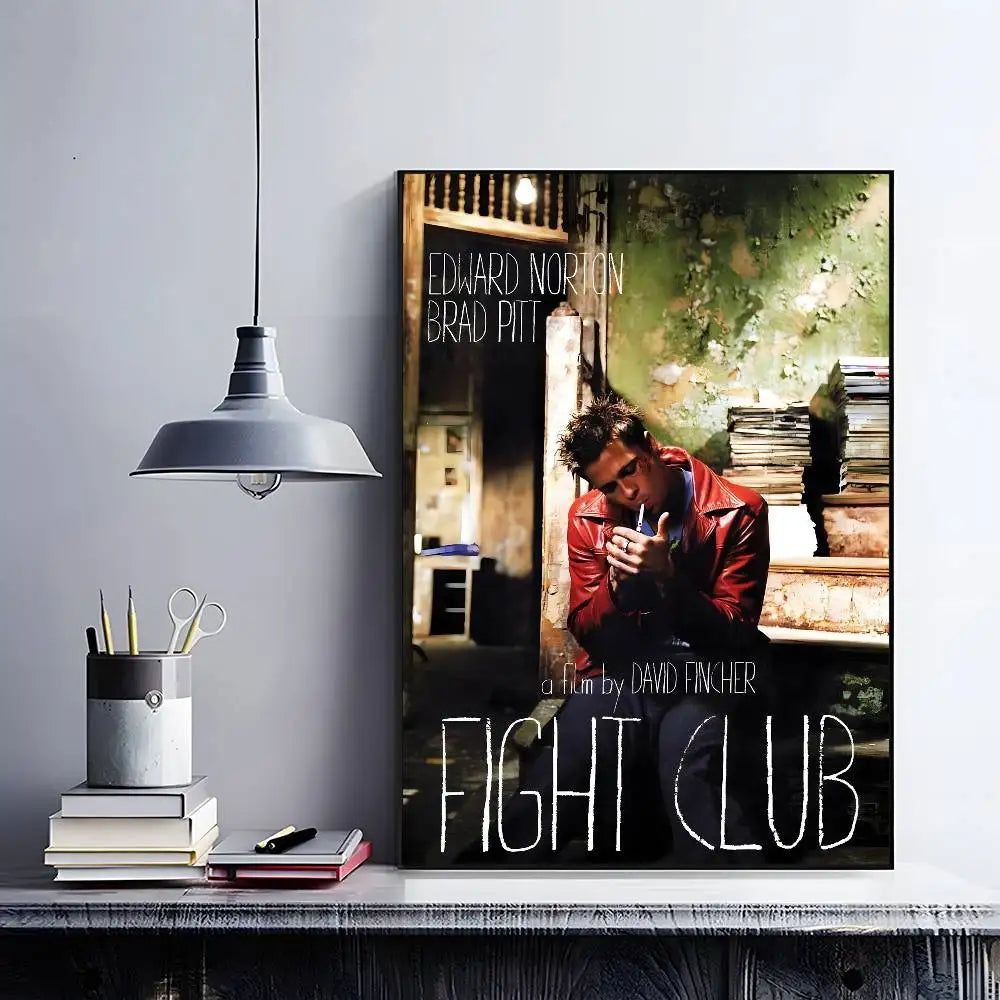 A framed movie poster of Fight Club featuring a man in a red jacket and the title text.