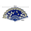 A dark blue folding fan with a lace trim and golden edge, shown flat.