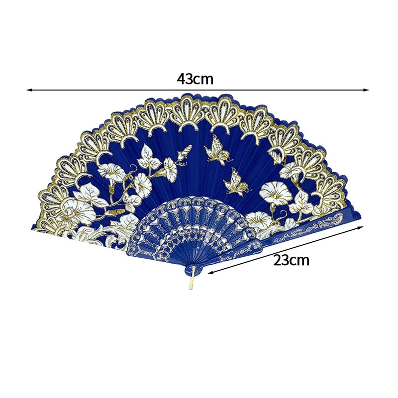 A dark blue folding fan with a lace trim and golden edge, shown flat.