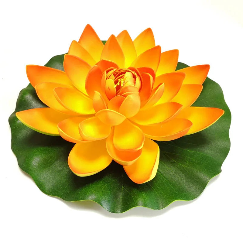 A vibrant orange lotus flower blooming on a green leaf for pond and garden decor.