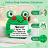 A handmade knitted frog emotional companion doll in green with a positive message card