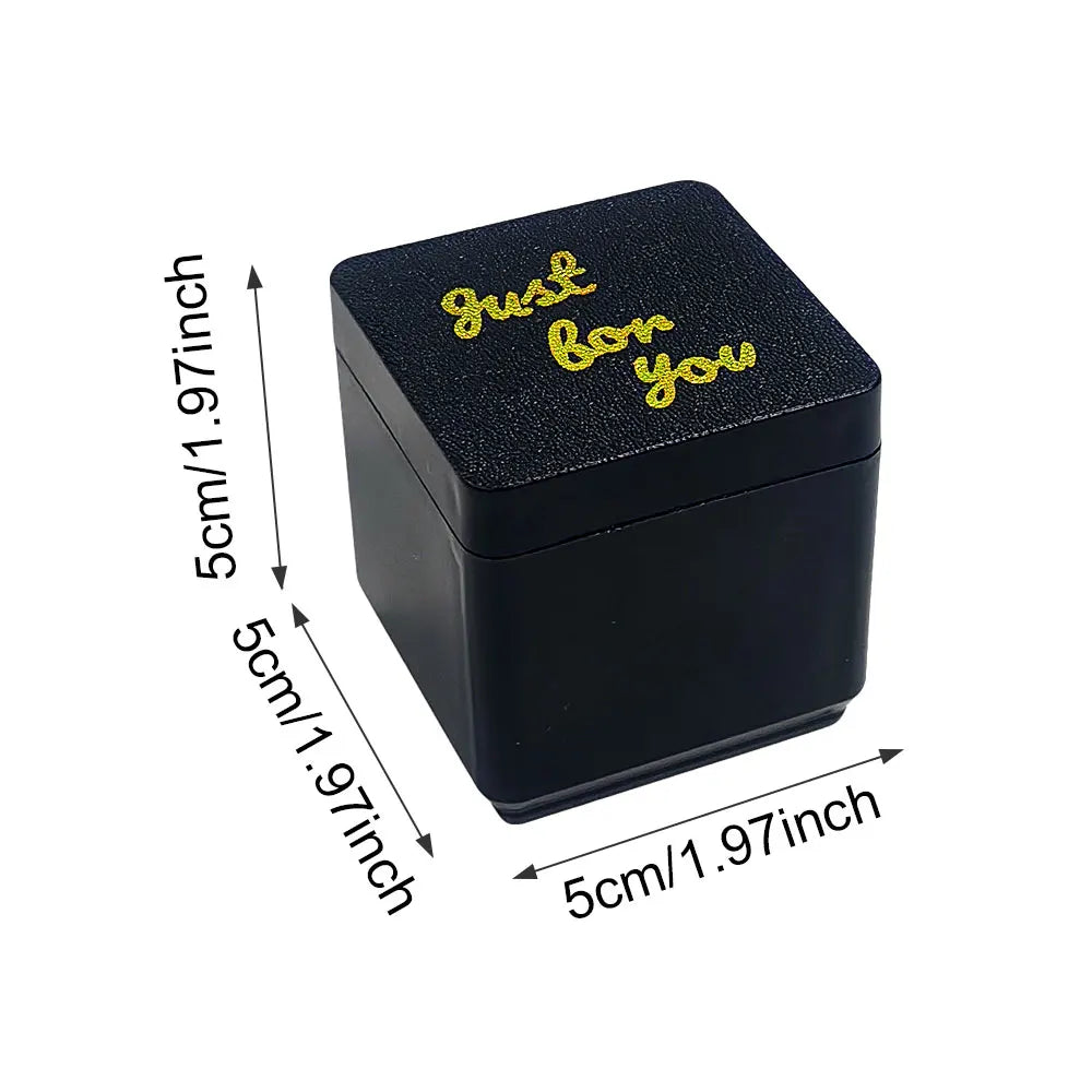 A small black box with gold text that reads Just for you