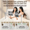 Two women using an adjustable foldable tablet stand for support while lying in bed.
