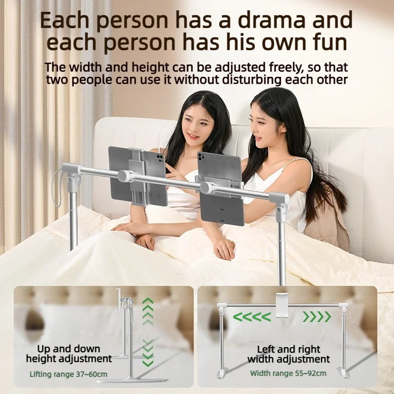 Two women using an adjustable foldable tablet stand for support while lying in bed.