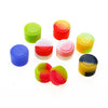 A collection of colorful silicone travel jars in shades of green, orange, red, yellow, and blue.