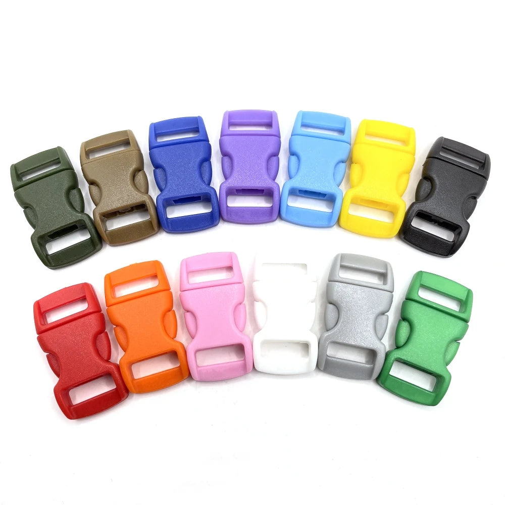 A collection of colorful plastic side-release buckles in various colors arranged in a row.