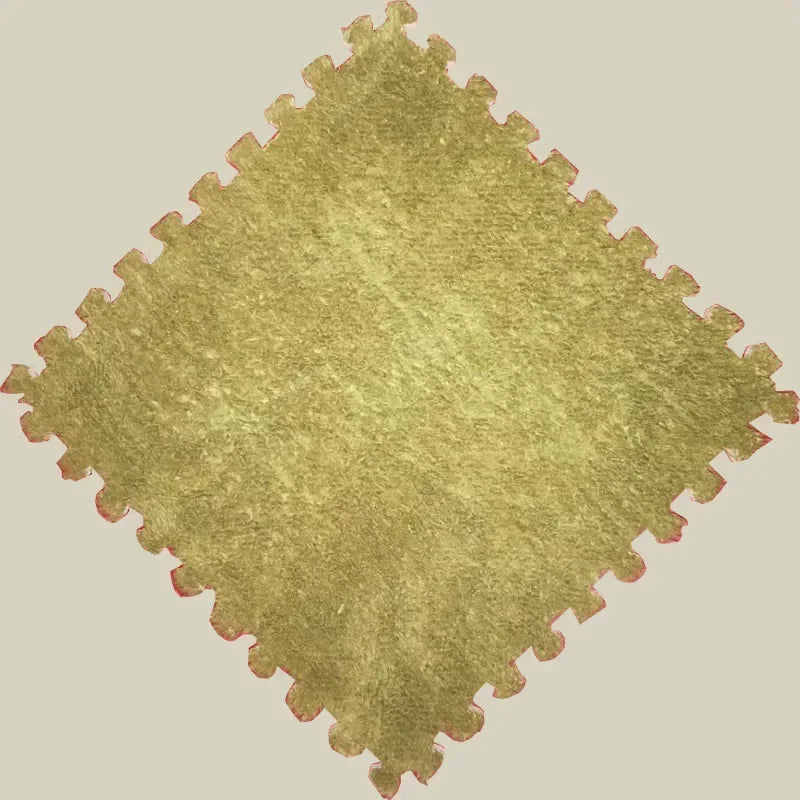 A square patch of soft, yellowish-green plush material with a serrated edge.