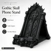 A black Gothic skull phone stand featuring intricate thorn details and a decorative frame.