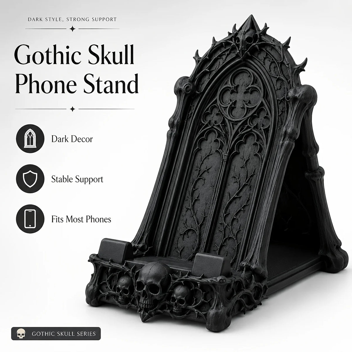 A black Gothic skull phone stand featuring intricate thorn details and a decorative frame.