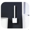 Wall-mounted toilet brush set featuring TPR bristles and a silicone head for efficient cleaning.