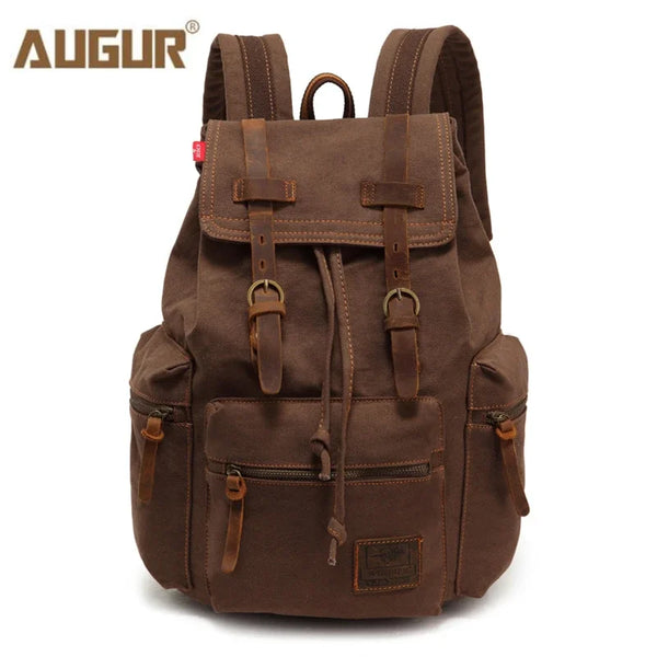 A brown vintage canvas backpack with leather accents and multiple pockets.