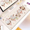 A large kawaii cartoon gaming desk mat featuring cute ice cream and animal designs on a white surface.