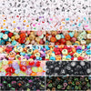 A collection of colorful acrylic alphabet letter beads in various shapes and colors for jewelry making.