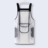A white kitchen apron with black trim and a pocket, featuring gray textured fabric details.
