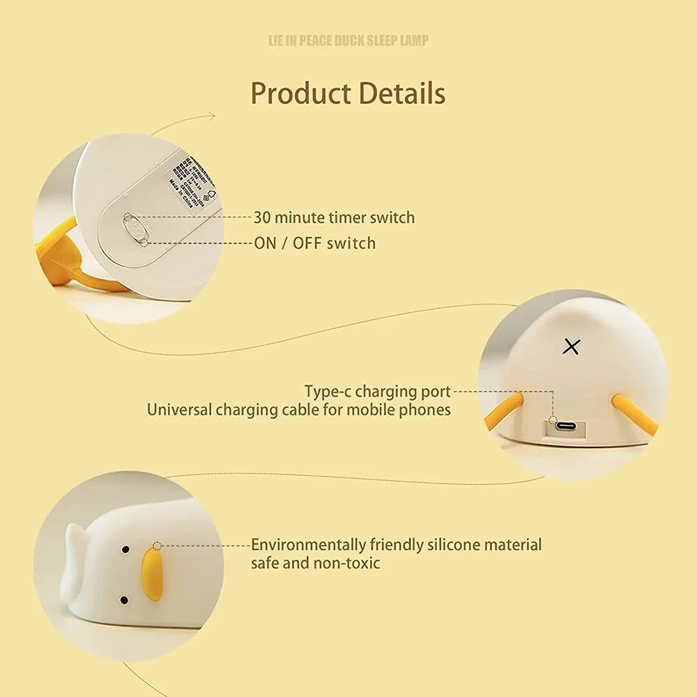 A white silicone duck sleep lamp with a timer switch and an on/off switch, showing details of its features.