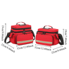 A pair of red waterproof double-layer trauma and first aid bags with black straps.
