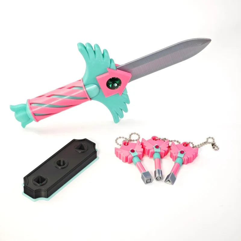 A set of four pink and teal dagger key necklaces with silver charms.