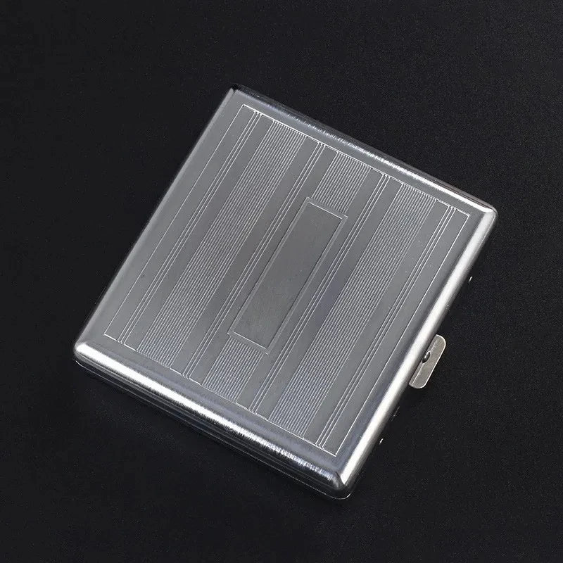 A silver stainless steel cigarette case with an embossed linear pattern shown from above.