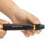 A hand holds a black and gold adjustable high-pressure water spray nozzle for car washing and garden watering.