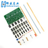 A green circuit board with multiple components and wires is shown next to a wooden stick, representing a 6-digit digital cloc