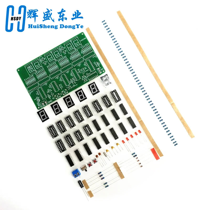 A green circuit board with multiple components and wires is shown next to a wooden stick, representing a 6-digit digital cloc