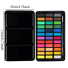 A professional watercolor paint set with a black metal case featuring numerous colored paint tubes.