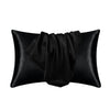 Black silky smooth satin pillowcase rolled and folded