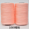 Two spools of pink 3-ply polyester knitting yarn for crochet and hand crafts