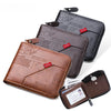 A set of dark brown vintage PU leather zipper wallets featuring a coin pocket and embossed KUSIBI branding.