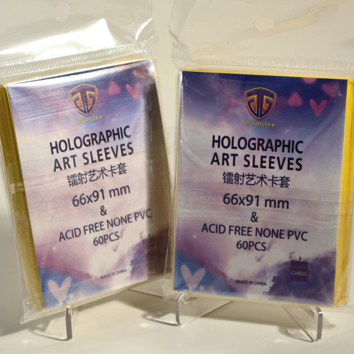 A package of holographic art sleeves with heart shapes, sold in a 60-piece pack.