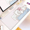 A pink and white kawaii cartoon mouse desk mat featuring a cute mouse character on a white gaming surface.