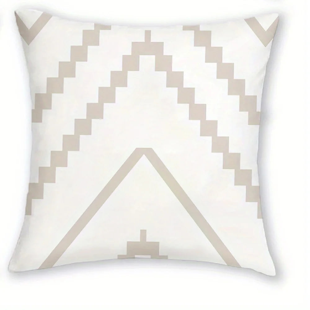 A white decorative pillowcase featuring a geometric pattern of light beige zigzags and a central triangle design.