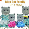 A family of blue cats in plush form, including a mother and kittens.