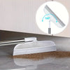 A silver detachable broom with a double-sided silicone scraper is shown next to a surface, illustrating its 180 degree cleani