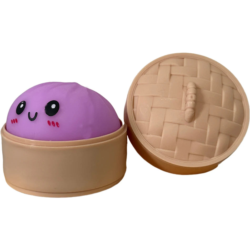 Lila, quicheliartiges Dumpling-Sensorspielzeug mit passender beige Deckel.