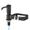 A black built-in kitchen sink soap dispenser with a sponge holder and blue water line.