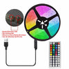 A circular multicolor RGB LED light fixture with a remote control and power cable.