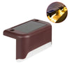 A rectangular, dark brown solar deck light with a glass panel and an illuminated beam shown next to a close-up of its functio