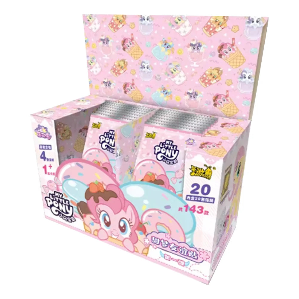 A box of My Little Pony Friendship Eternal Radiant Moon Gilded Card Pack featuring pony figures and card packs.
