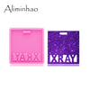A pink silicone resin mold with the text YAVIX inside and a purple glitter mold with the word XRAY.