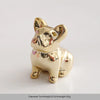 Gold-toned ceramic elephant and rabbit jewelry holder with a shiny finish